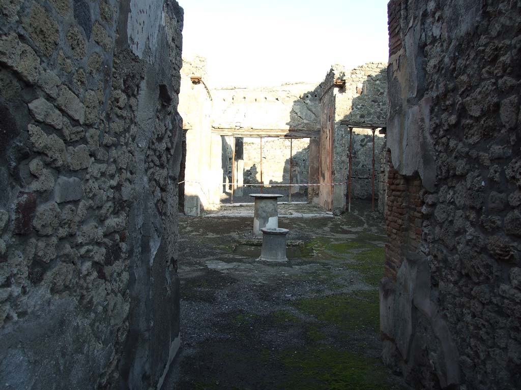 VI.14.40 Pompeii. December 2007. Looking east from fauces or entrance corridor, across atrium to tablinum.
According to Garcia y Garcia, this house also had two rooms hit by the 1943 bombardment, with the loss of IV style painting.
See Garcia y Garcia, L., 2006. Danni di guerra a Pompei. Rome: L’Erma di Bretschneider. (p.93, with two photos by Tatiana Warscher pre 1943 on p.94).