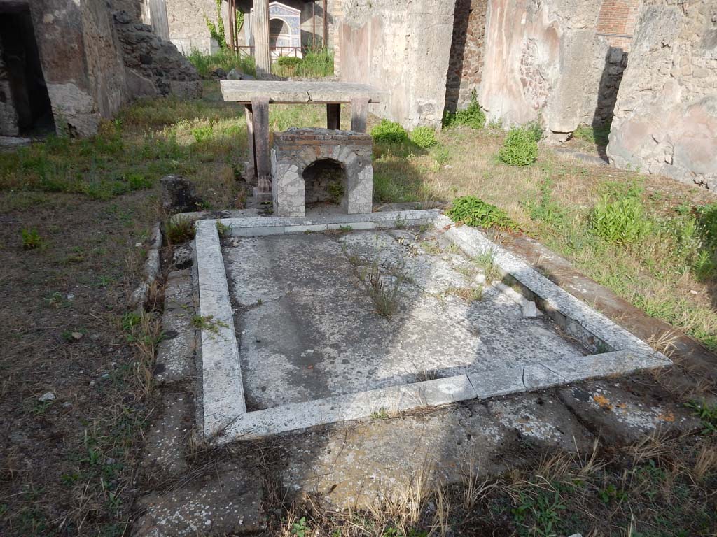 VI.14.43 Pompeii. June 2019. Room 1, looking east across impluvium in atrium. Photo courtesy of Buzz Ferebee.