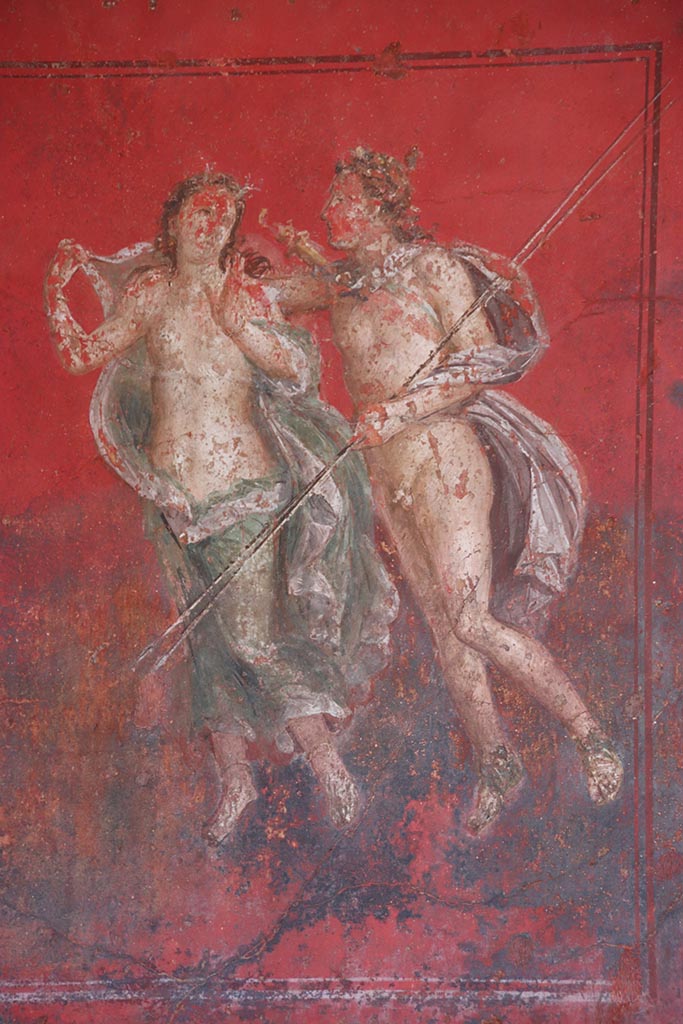 VI.15.1 Pompeii. October 2024.
West end of north wall, detail of figures in middle of panel. Photo courtesy of Klaus Heese.