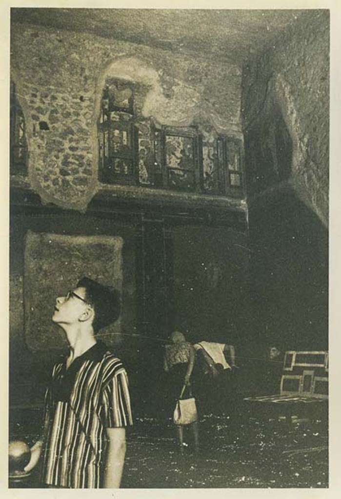 VI.15.1 Pompeii. 22nd July 1961. Upper north wall at east end, and north-east corner in room of the cupids or cherubs, with floating figures in centre of panels. Photo courtesy of Rick Bauer.