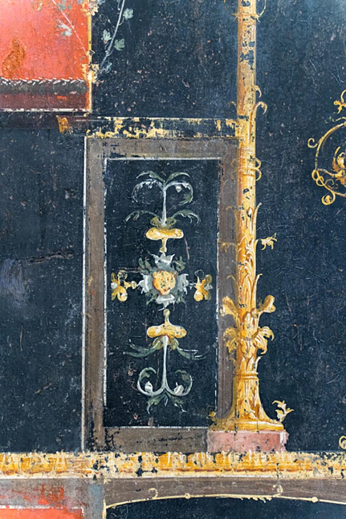 VI.15.1 Pompeii. August 2023.
Detail from panel on north side of painted candelabra on east wall. Photo courtesy of Johannes Eber.
