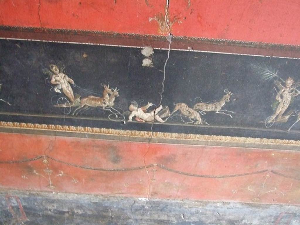 VI.15.1 Pompeii. December 2006. Room of the Cupids or Cherubs. East wall. Detail from Painting of Cupids in a Race between Chariots pulled by Deer