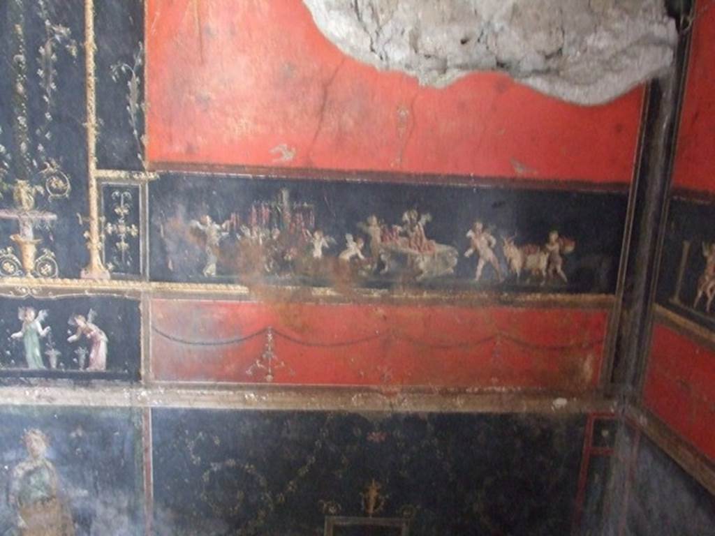 VI.15.1 Pompeii. December 2006. East wall in south-east corner with painting of cupids picking flowers and making garlands.