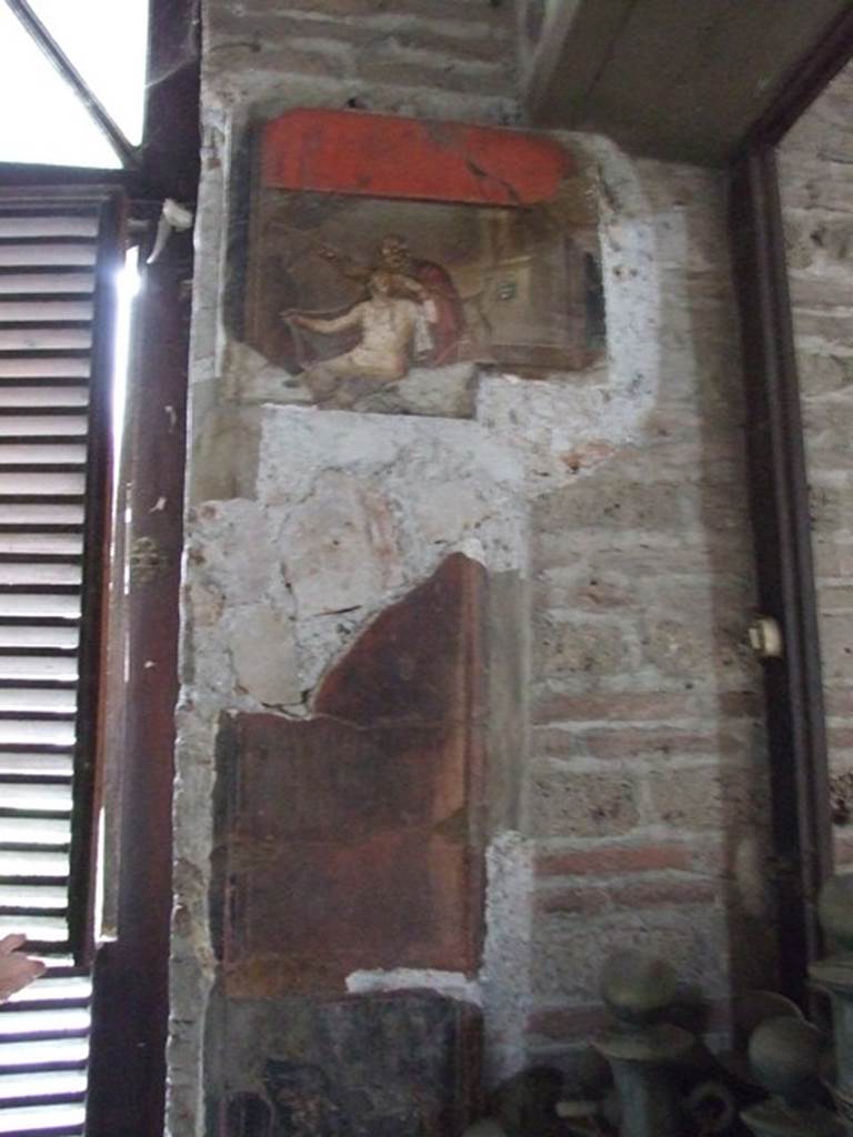 VI.15.1 Pompeii. December 2006. Wall painting on west side of entrance doorway, on south wall.
According to Peters, this is on a pier to the right of the main entrance.
See Peters, W.J.T. (1963): Landscape in Romano-Campanian Mural Paintings. The Netherlands, Van Gorcum & Comp. (p. 136, Plate 122).