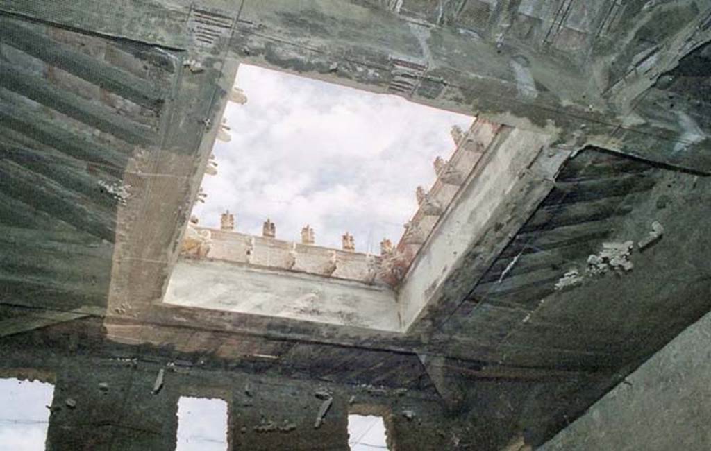 VI.15.1 Pompeii. October 2001. Compluvium above impluvium in atrium, showing grondaia, or water-spouts. Photo courtesy of Peter Woods.