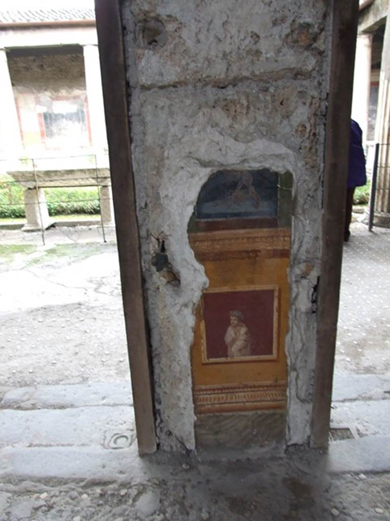 VI.15.1 Pompeii. December 2006. Detail of second painted pillar between Peristyle and Atrium.