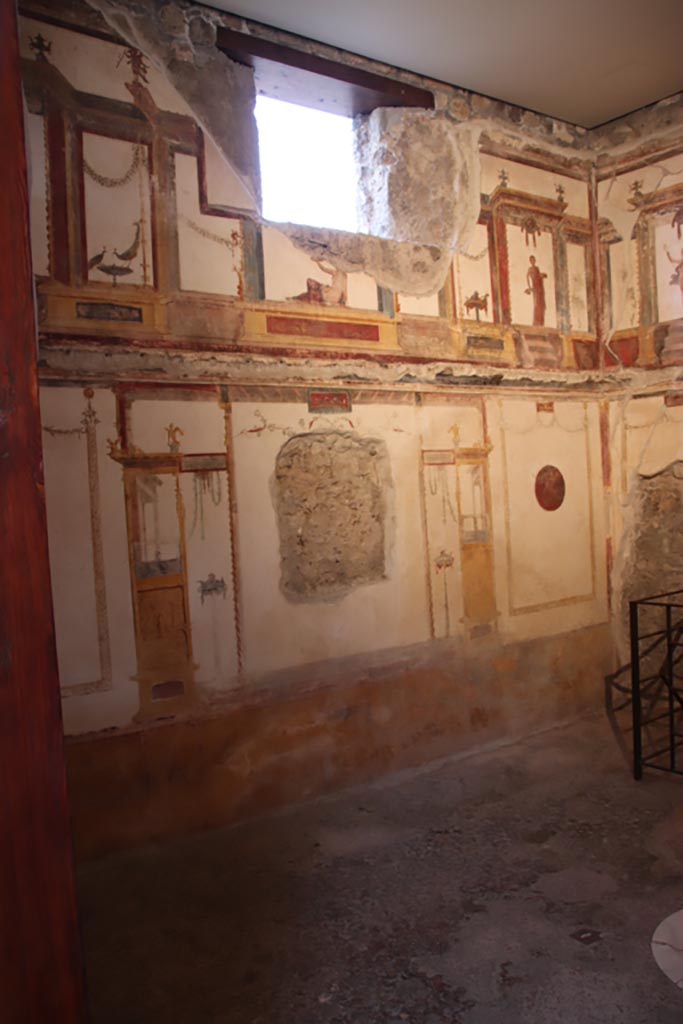 VI.15.1 Pompeii. October 2023.
Looking towards south end of east wall from doorway. Photo courtesy of Klaus Heese.