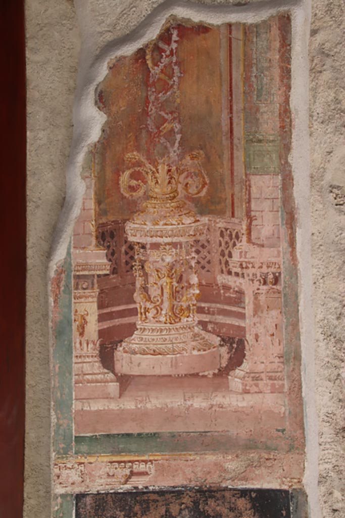 VI.15. I Pompeii. October 2023.
South side of atrium, decorative painting between doorways. Photo courtesy of Klaus Heese.