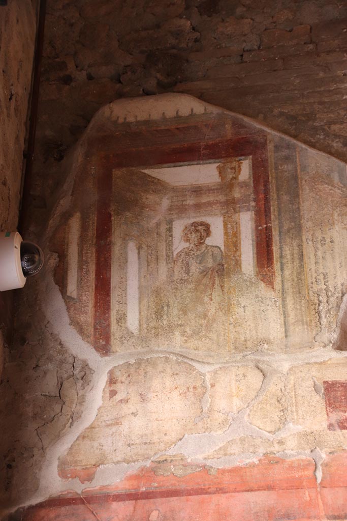 VI.15.1 Pompeii. October 2024. Room (p), upper panel at west end of north wall of exedra.
Photo courtesy of Klaus Heese.