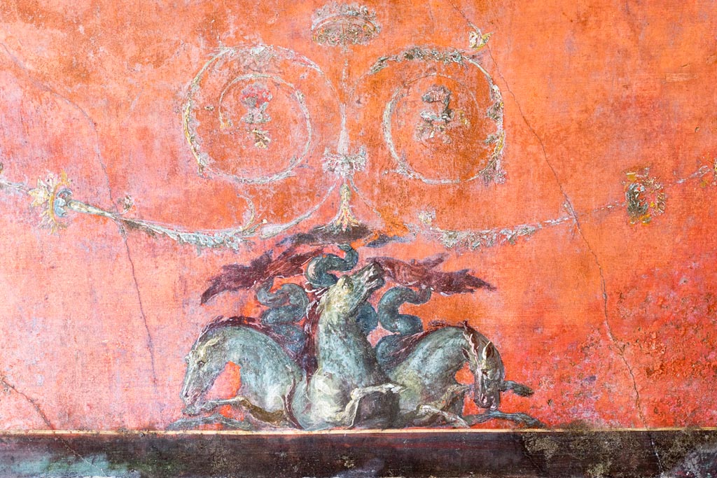 VI.15.1 Pompeii. March 2023. North wall of exedra – detail from below central painting. Photo courtesy of Johannes Eber.
