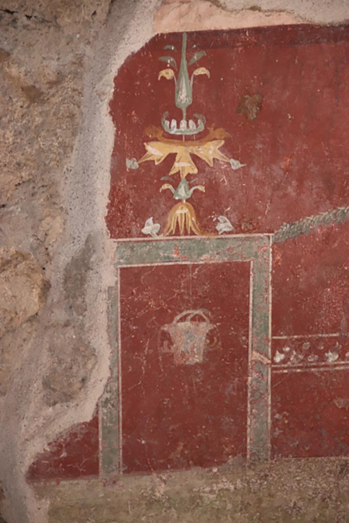 VI.15.1 Pompeii. October 2023.
Detail of zoccolo on lower north wall at west end. Photo courtesy of Klaus Heese.