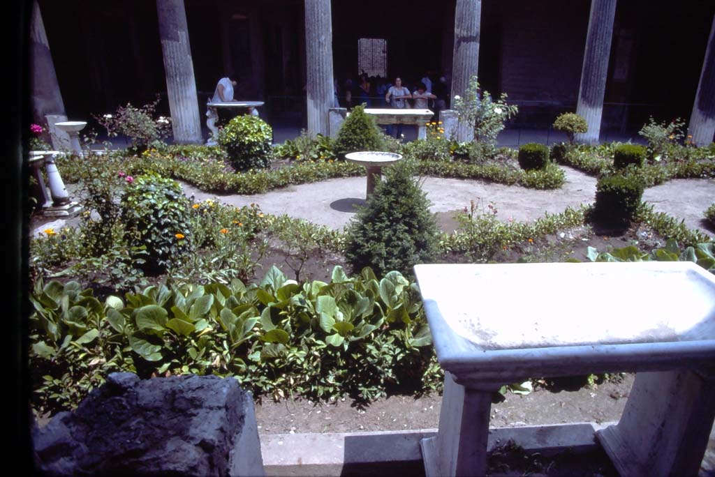 VI.15.1 Pompeii. July 1980. Looking east across peristyle, from west portico.
Photo courtesy of Rick Bauer, from Dr George Fay’s slides collection.