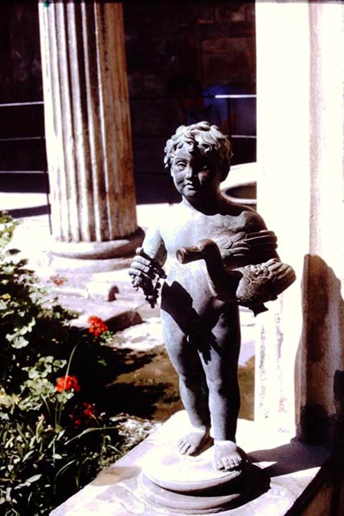 VI.15.1 Pompeii, 1968. Bronze statuette of boy with grapes and a duck. Photo by Stanley A. Jashemski.
Source: The Wilhelmina and Stanley A. Jashemski archive in the University of Maryland Library, Special Collections (See collection page) and made available under the Creative Commons Attribution-Non Commercial License v.4. See Licence and use details.
J68f0679