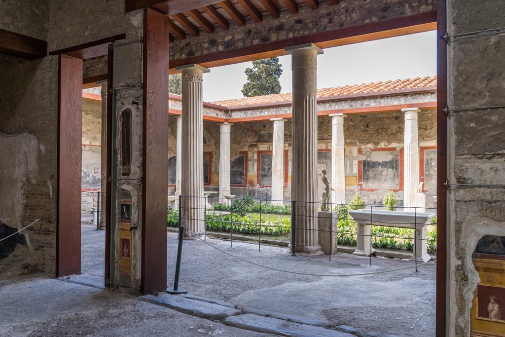 VI.15.1 Pompeii. March 2023. Looking south-west to peristyle from atrium. Photo courtesy of Johannes Eber.