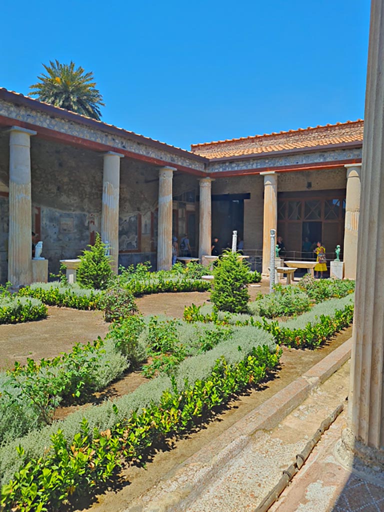 VI.15.1 Pompeii, June 2024.
Looking north-west across peristyle from south-east corner. Photo courtesy of Giuseppe Ciaramella.