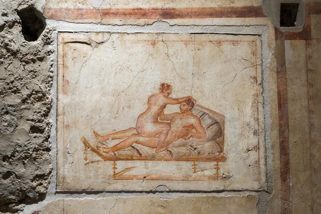 VI.15.1 Pompeii. March 2023.
Erotic painting in bedroom, used either by servants or perhaps as a private brothel? Photo courtesy of Johannes Eber.