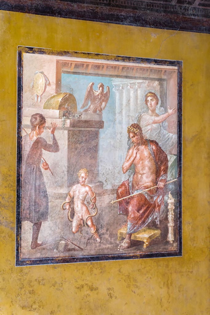VI.15.1 Pompeii. March 2023.
Central painting from north wall of exedra - Hercules strangling the serpents.
Photo courtesy of Johannes Eber.