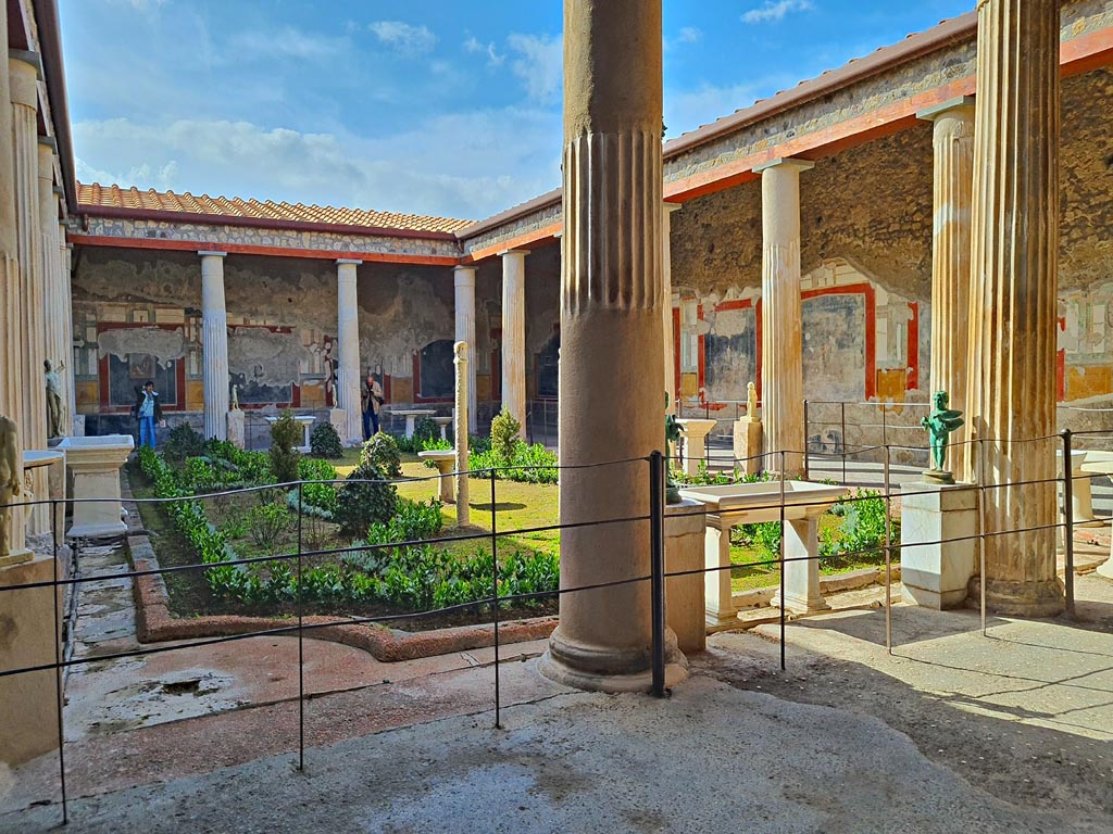 VI.15.1 Pompeii. April 2023.
Looking south-west across peristyle garden from east end of north portico. Photo courtesy of Giuseppe Ciaramella.