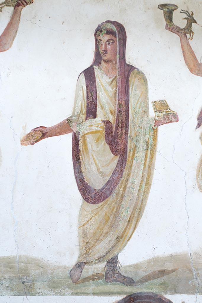 VI.15.1 Pompeii. March 2023.
Detail of the Genius from lararium painting. Photo courtesy of Johannes Eber.