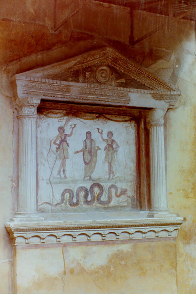 VI.15.1 Pompeii. 4th April 1980, pre-earthquake.
Household lararium. Photo courtesy of Tina Gilbert.