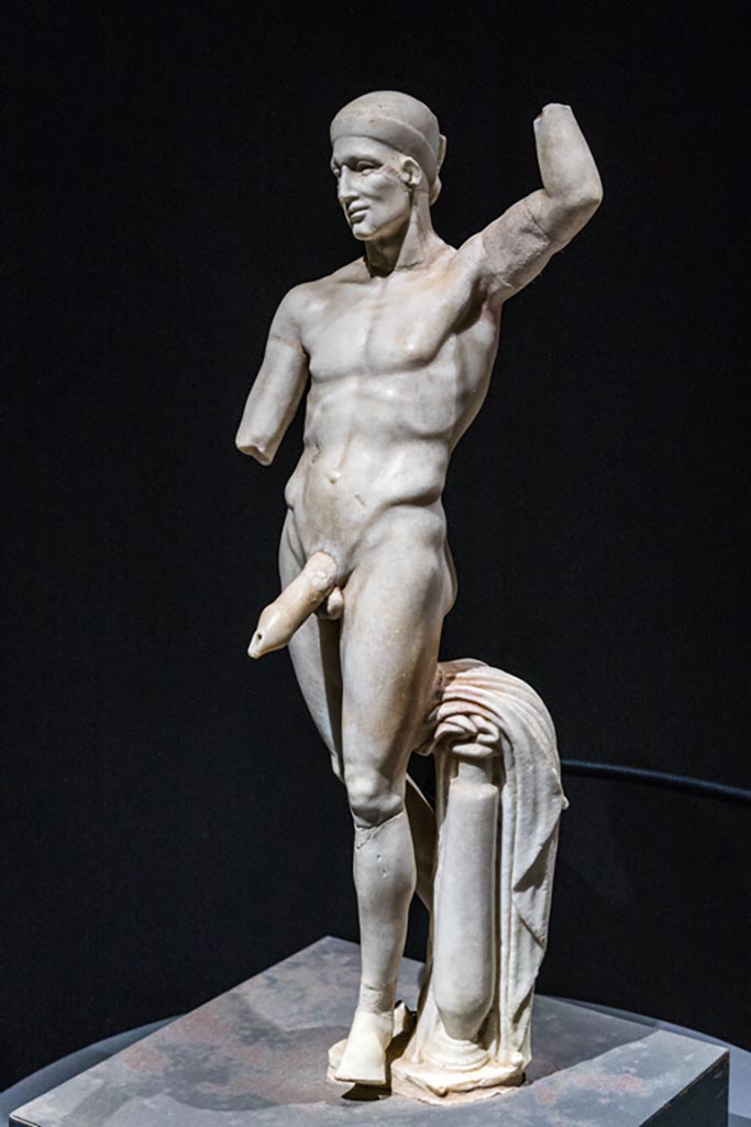 VI.15.1 Pompeii. January 2023.
Statue of Priapus displayed in exhibition in Palaestra. Photo courtesy of Johannes Eber.