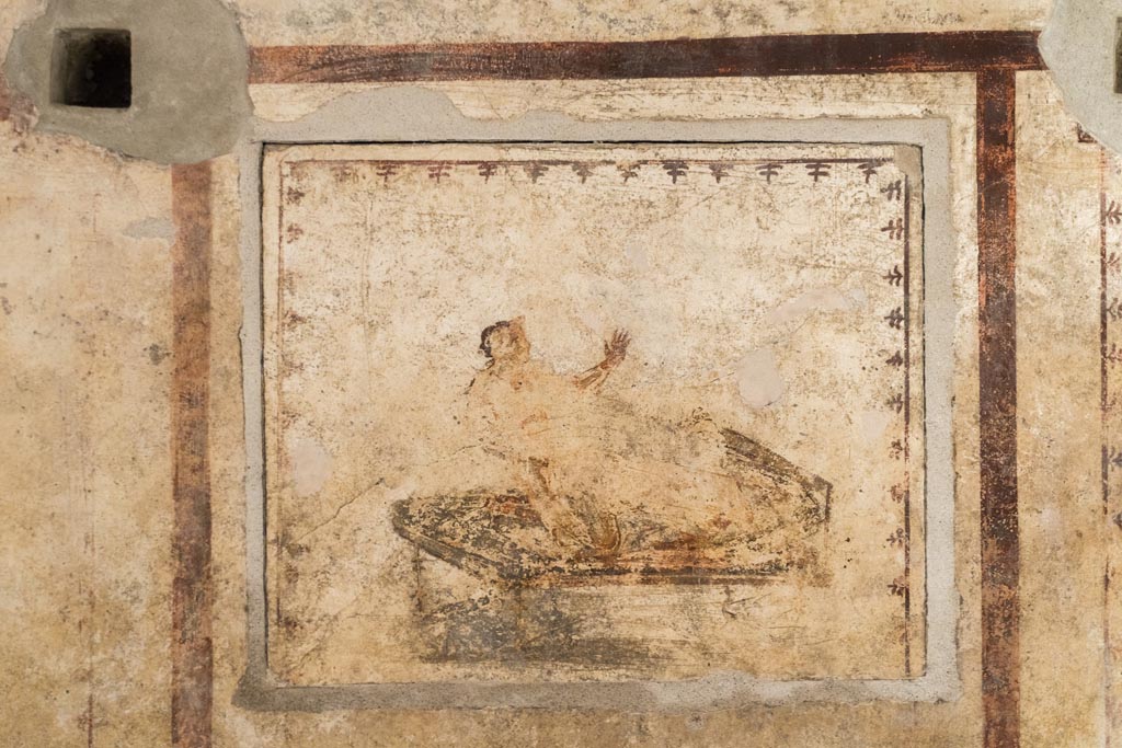 VI.15.1 Pompeii. March 2023.
North wall, erotic painting in bedroom (x’), used either by servants or as a private brothel? Photo courtesy of Johannes Eber.