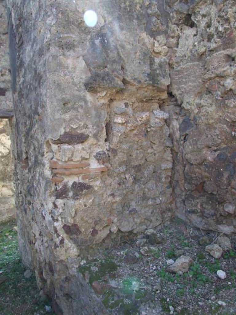 VI.15.5 Pompeii. March 2009. Room 2. South end of bench.