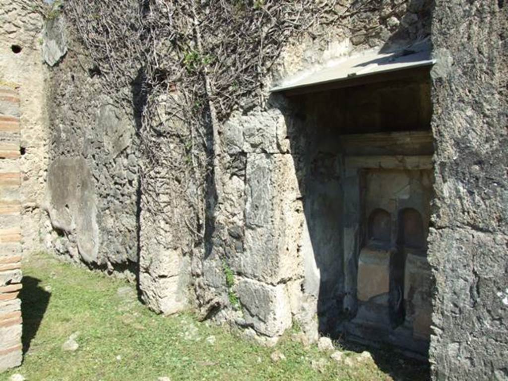 VI.15.5 Pompeii. March 2009. Room 1. Atrium. Altar. North east corner of atrium, with Altar and doorway to Room 3.