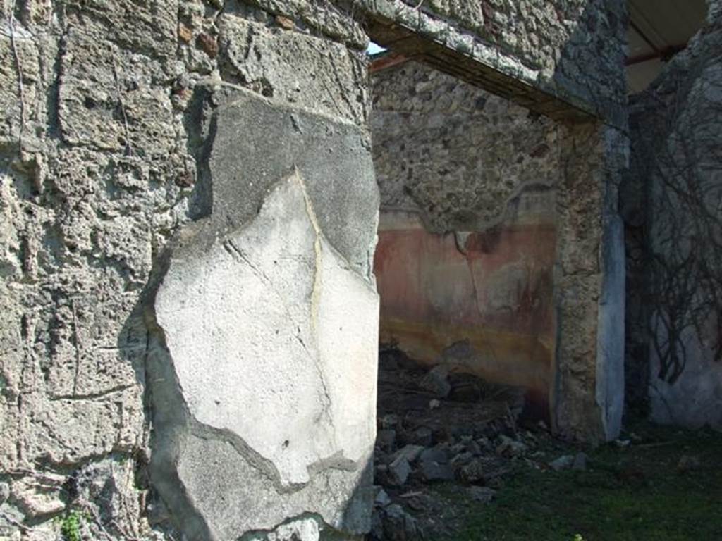 VI.15.5 Pompeii. March 2009. Doorway to room 8, triclinium. Looking south-east from east portico.