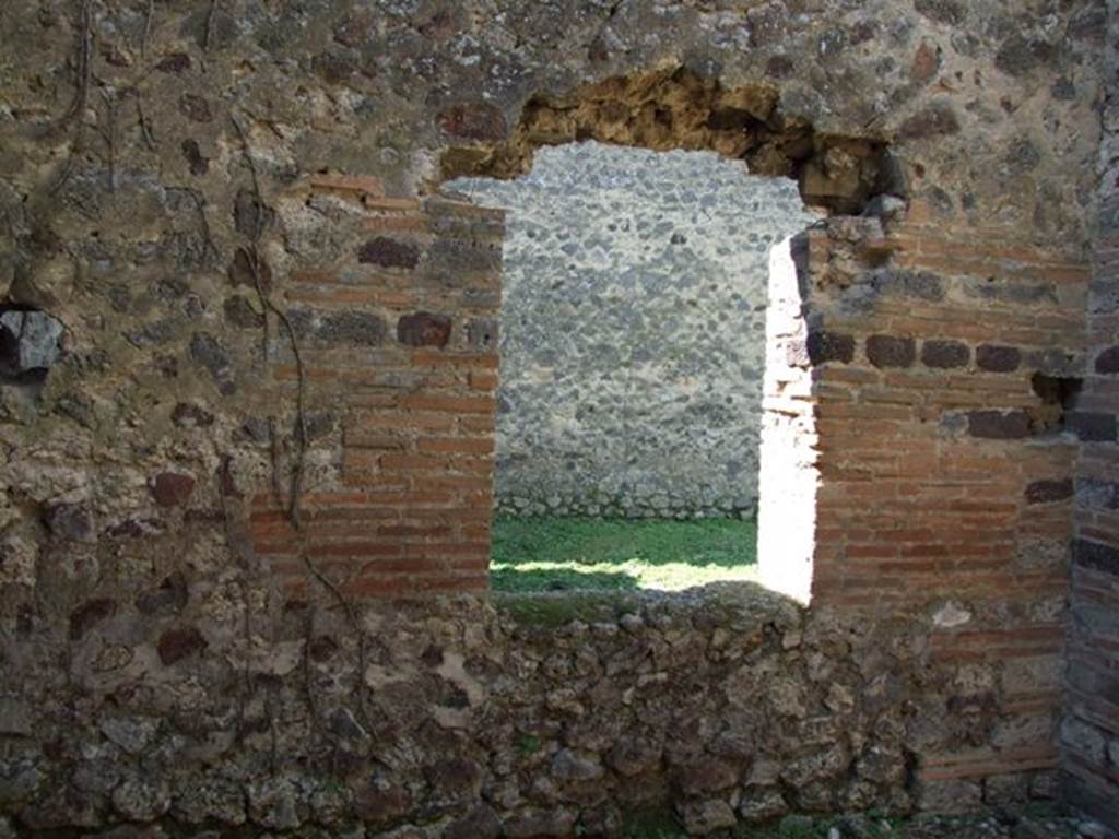 VI.15.5 Pompeii. March 2009. Room 10. West wall with window to garden area.
