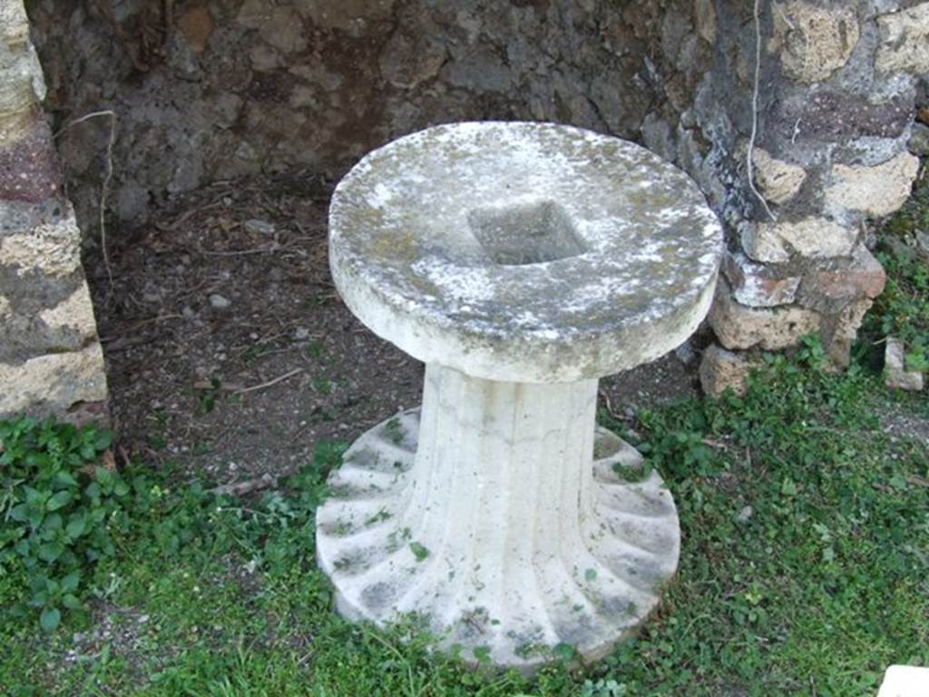 VI.15.5 Pompeii. March 2009. White marble base for a fountain.
