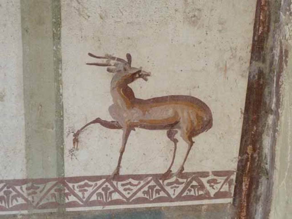 VI.15.8 Pompeii. May 2010. Detail from east wall of summer triclinium.