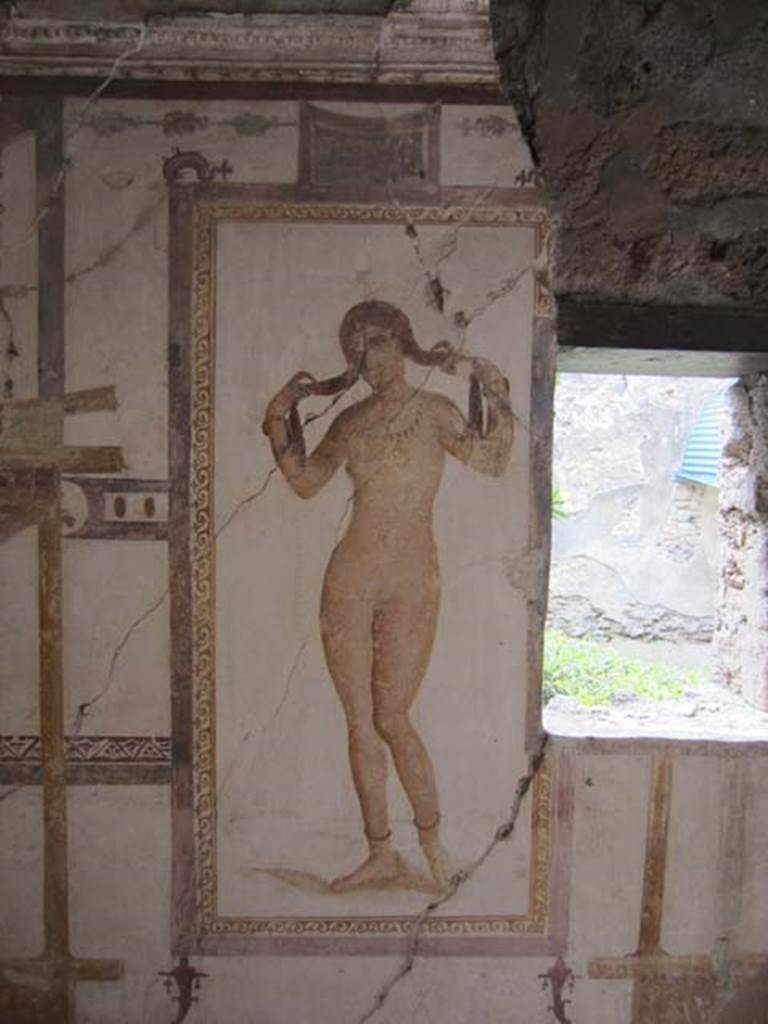 VI.15.8 Pompeii. April 2012. Fresco of female figure (Venus?) on the west wall of the summer triclinium. Photo courtesy of Marina Fuxa.