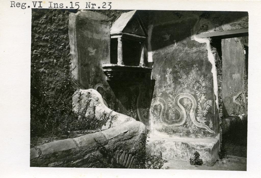 VI.15.23 Pompeii. Pre-1937-39.
Lararium in north-west corner of kitchen, near doorway to south portico, with serpents extending over both the west and north walls.
Photo courtesy of American Academy in Rome, Photographic Archive. Warsher collection no. 553.