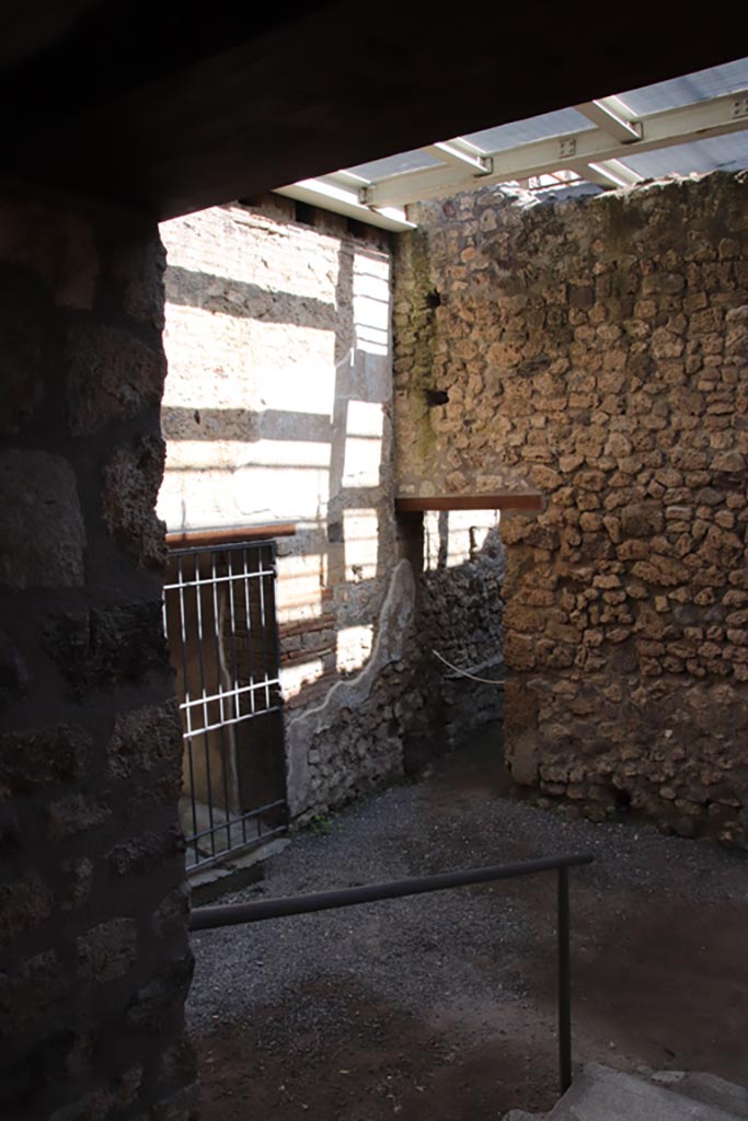 VI.15.27 Pompeii. October 2023.
Looking north-east from top of steps at east end of room o. Photo courtesy of Klaus Heese.