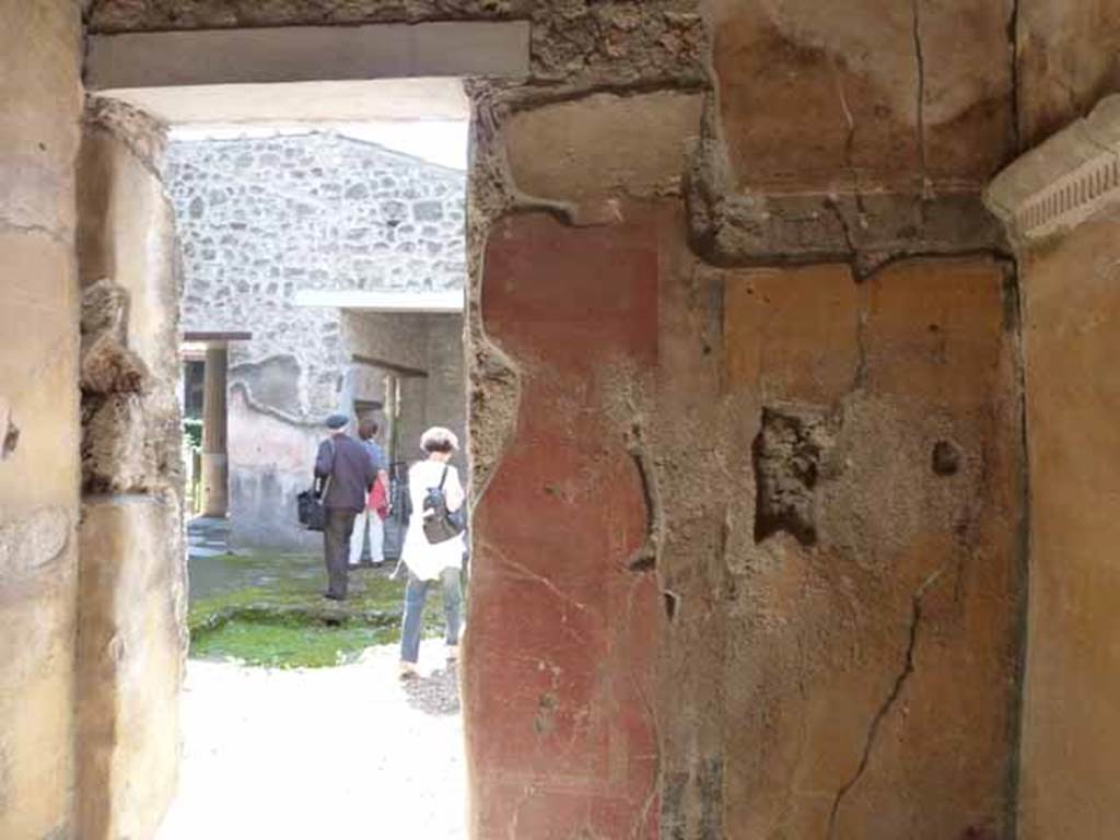 VI.16.7 Pompeii. May 2010. West wall of room C, with doorway to atrium.