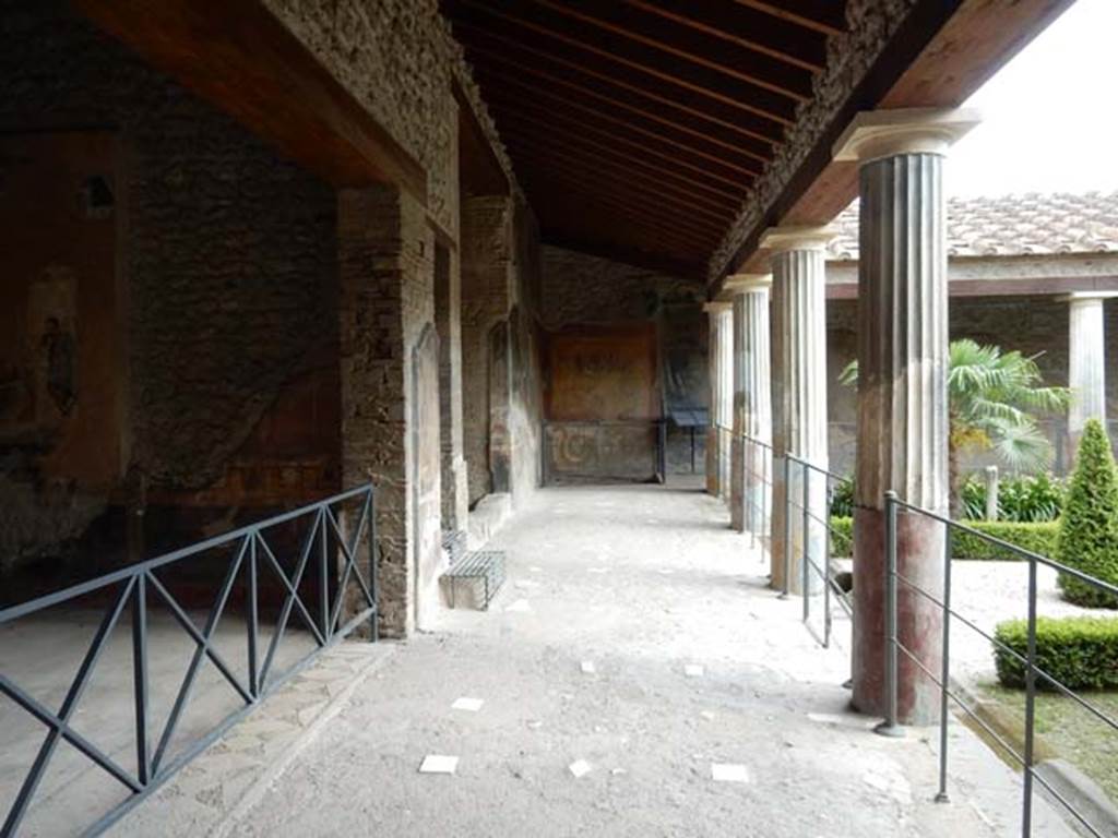VI.16.7 Pompeii. May 2016. Room F, east portico. Looking south towards the lararium in south-east corner. Photo courtesy of Buzz Ferebee.