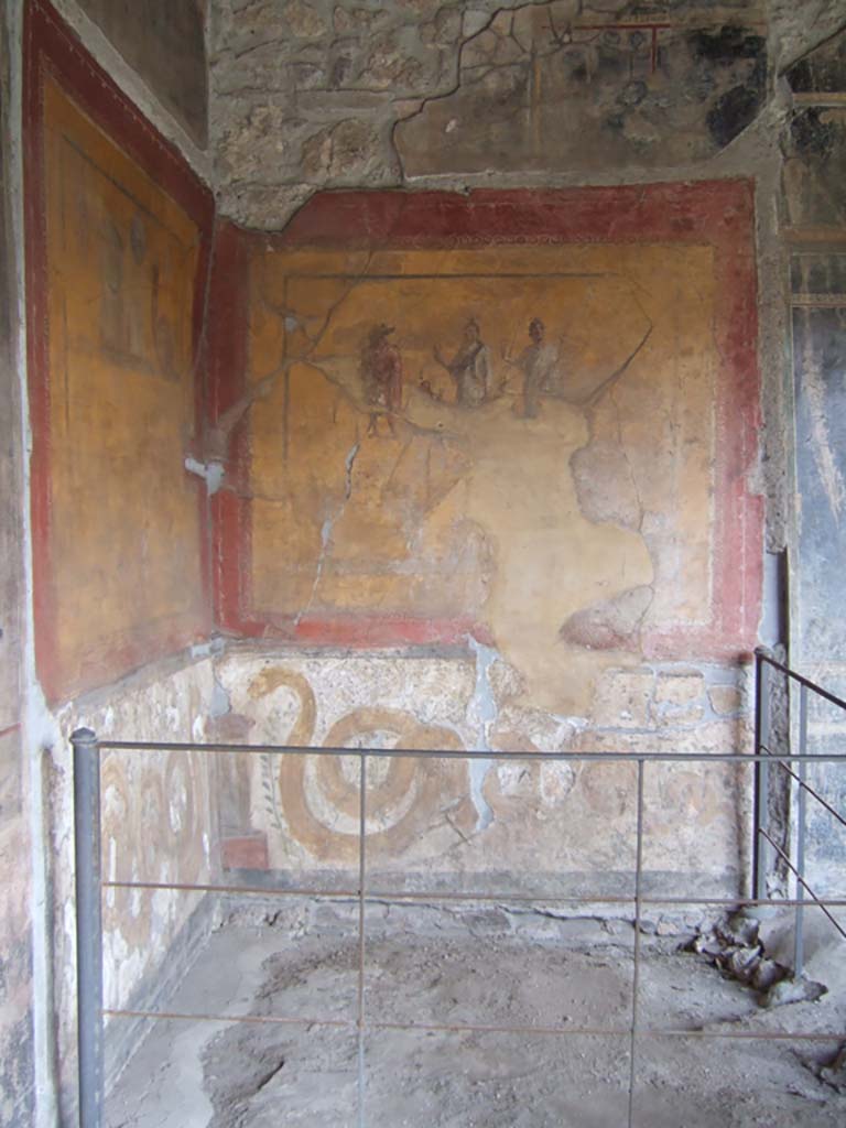 VI.16.7 Pompeii. May 2006.
Room F, painting of the gods on the lararium on the south wall in the south-east corner of the peristyle.