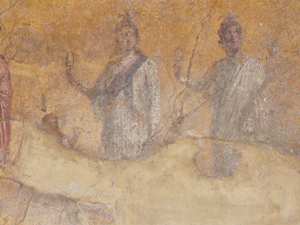 VI.16.7 Pompeii. June 2013. Room F, on the south wall of the peristyle.
Painting of Isis and Osiris and the small figure possibly of Harpocrates, after recent restoration.
Photo courtesy of Buzz Ferebee.