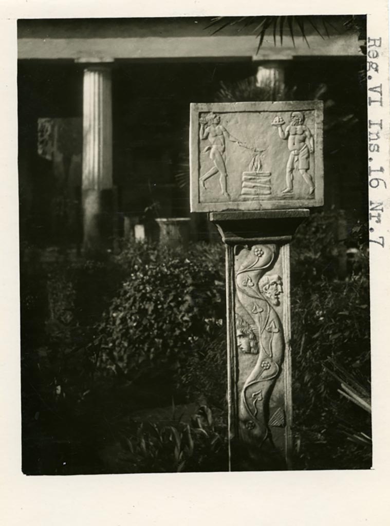 VI.16.7 Pompei. Pre-1937-39. Flat post with rectangular relief showing a satyr and Silenus making a sacrifice at an altar.
Photo courtesy of American Academy in Rome, Photographic Archive. Warsher collection no. 1438.