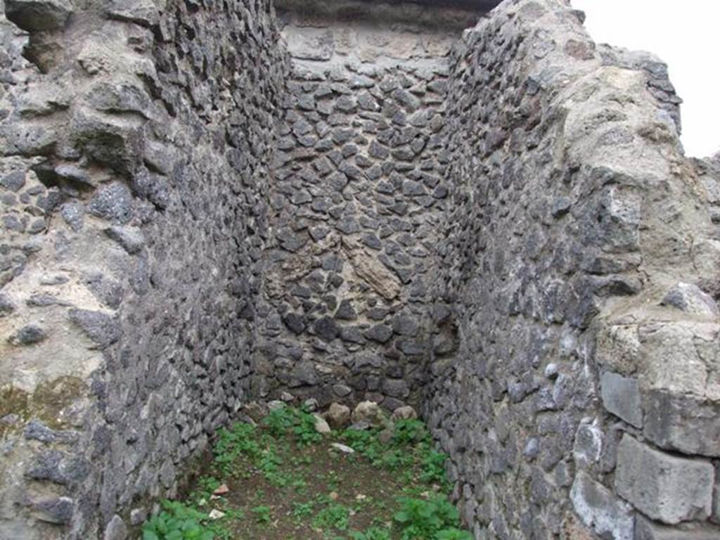 VI.16.8 Pompeii. December 2007. Looking west towards site of staircase to upper floor.
According to NdS, the small entrance room contained the first section of the staircase with five masonry steps. At the top of the masonry steps was a staircase landing in wood supported by the beams. Above the landing, wooden stairs continued to the upper floor.
At the foot of the stairs was the circular mouth of a terracotta cistern. Found under the landing was a deposit of amphorae. See Notizie degli Scavi di Antichità, 1908, (p.54)