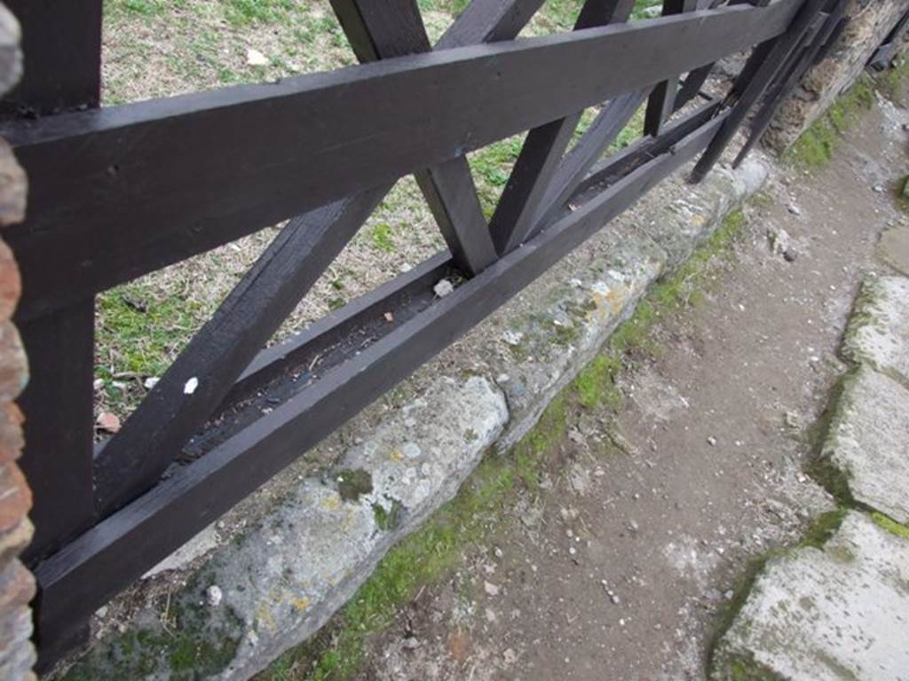 VI.16.13 Pompeii. December 2007. Threshold or sill. The lava threshold is seen with its usual groove for the shutters to close.