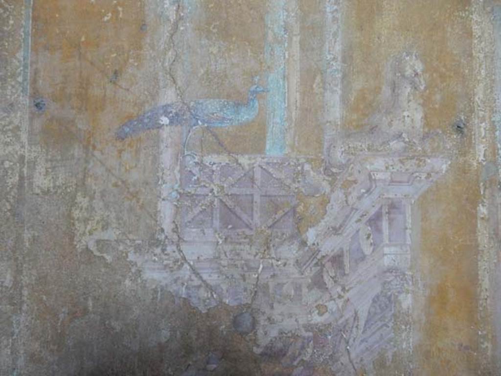 VI.16.15 Pompeii. May 2015. Room G, detail of wall decoration from west side of central painting on north wall. Photo courtesy of Buzz Ferebee.