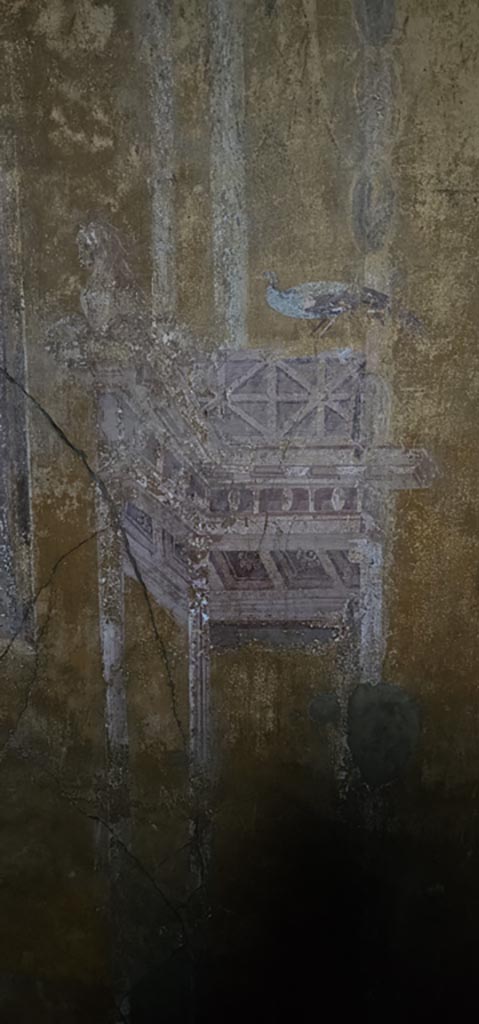 VI.16.15 Pompeii. December 2023.
Room G, north wall, detail from east side of central painting.
Photo courtesy of Miriam Colomer.