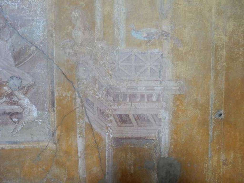 VI.16.15 Pompeii. May 2015. Room G, detail of wall decoration from east side of central painting on north wall. Photo courtesy of Buzz Ferebee.