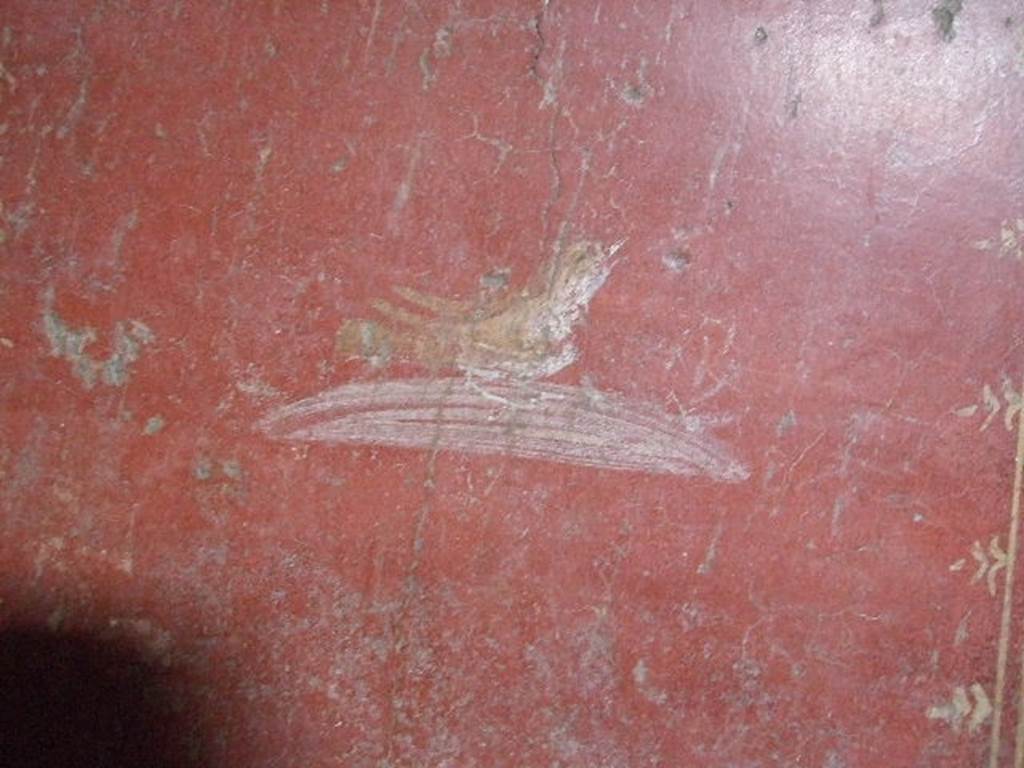 VI.16.15 Pompeii. December 2006. Wall painting of bird at south end of west wall in room H.