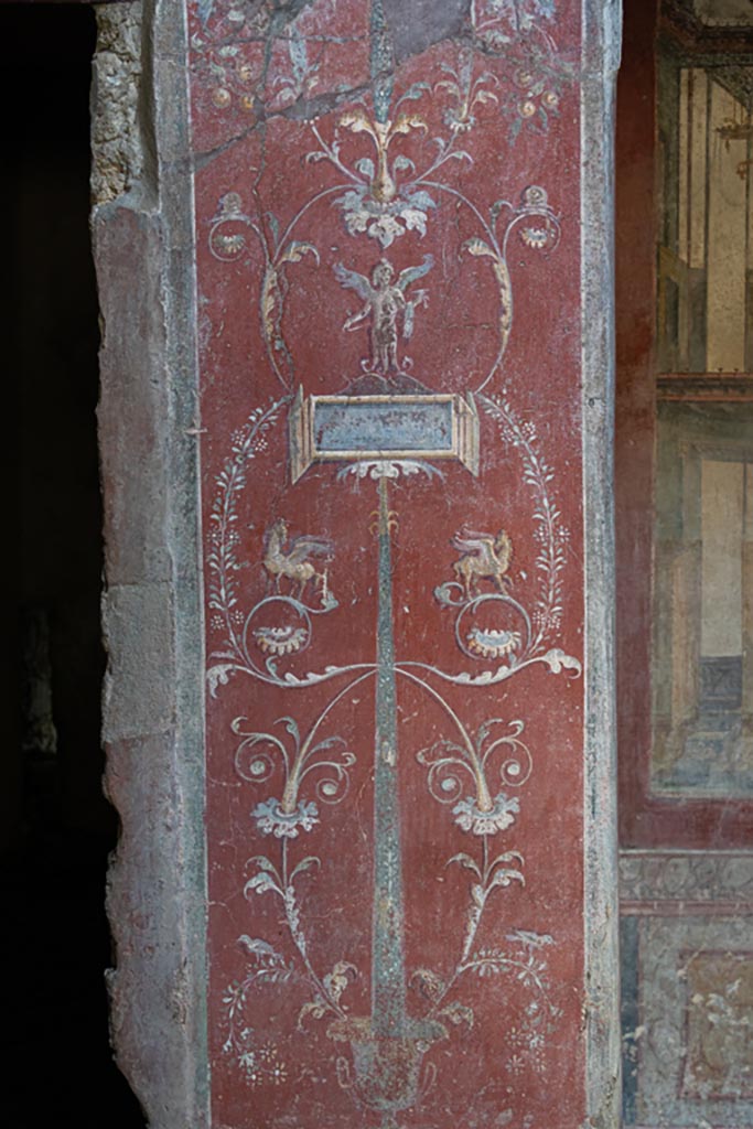 VI.16.15 Pompeii. January 2024.
Detail of painted pilaster on west side of atrium B. Photo courtesy of Johannes Eber.