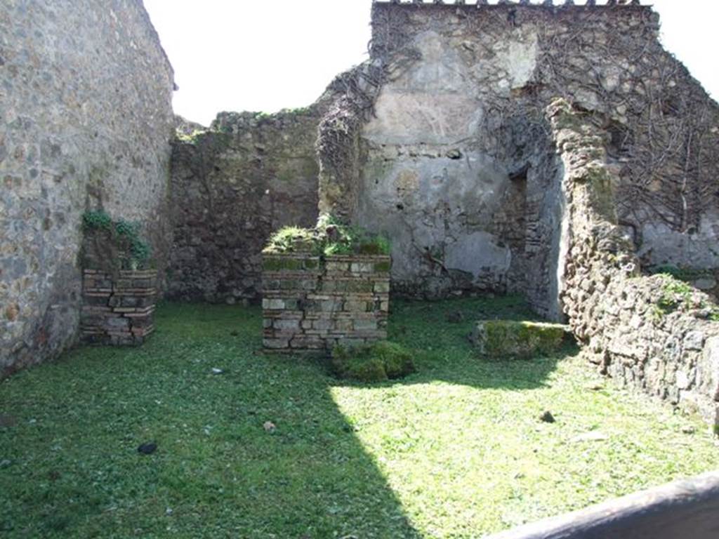 VI.16.18 Pompeii. March 2009. Looking west from entrance across workshop. According to NdS, the workshop itself was rather large with rough walls and concrete floor. In the south-east corner would have been the latrine, and in the north-east corner would have been remains of a small wall that could have been a large ruined hearth. The excavation of this workshop was started on 5th November 1903. See Notizie degli Scavi di Antichità, 1908, (p.180).
