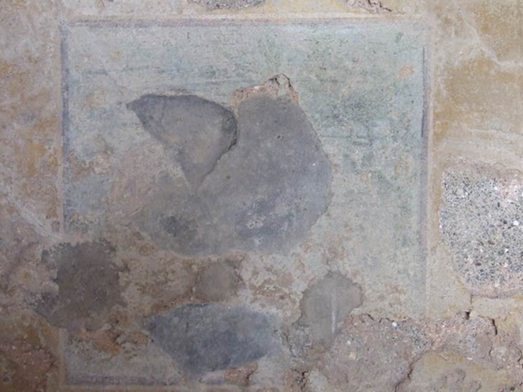 VI.16.27 Pompeii. March 2009. Room G, remains of wall painting at west end of north wall of triclinium. According to PPP, this was of Adone ferito. See Notizie degli Scavi di Antichità, 1908, 187. See Bragantini, de Vos, Badoni, 1983. Pitture e Pavimenti di Pompei, Parte 2. Rome: ICCD. (p.365)
According to NdS, on the north wall were two panels, on the left (0.30m high x 0.31m wide) was Wounded Adonis. Adonis with his right thigh bandaged, seated on the left but looking towards the right, with his right elbow on the back of the seat. Near to him was a cupid, who had a raised left arm. On the right side of the painting was a tree.