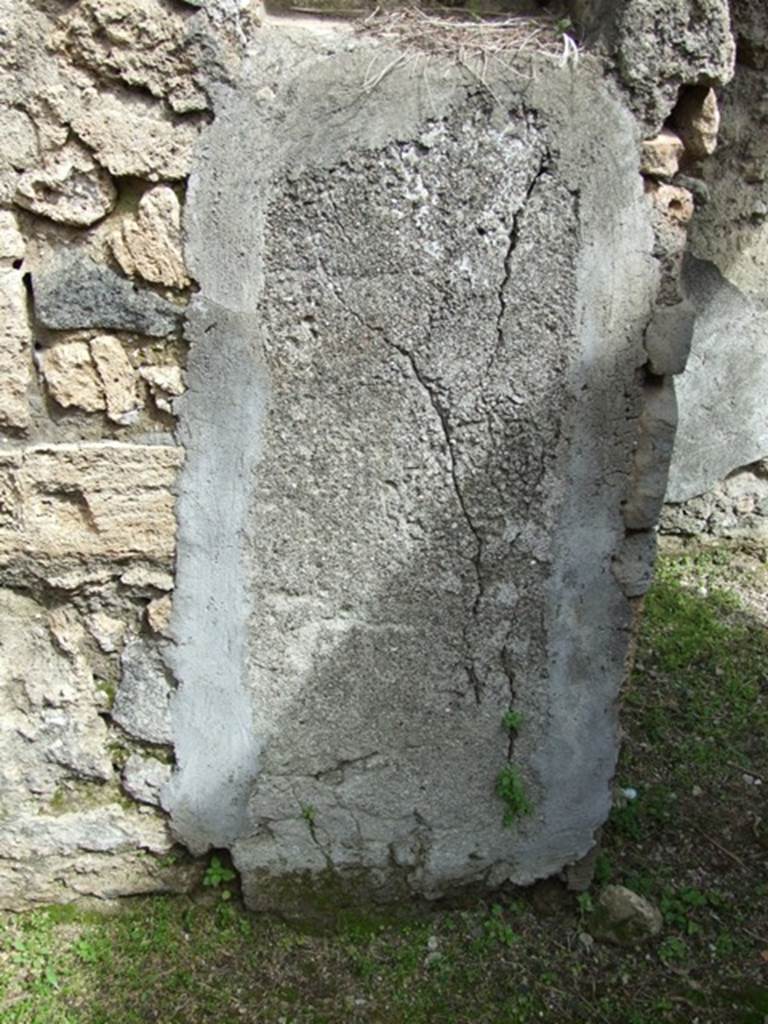 VI.16.27 Pompeii. March 2009. Remains of plaster below niche on east wall, room Y.